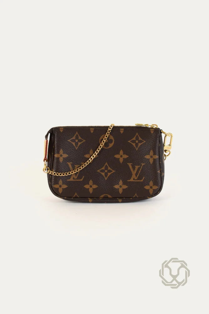 Sac accessoires Louis Vuitton monogramme pochette authentique OLUXE.MA