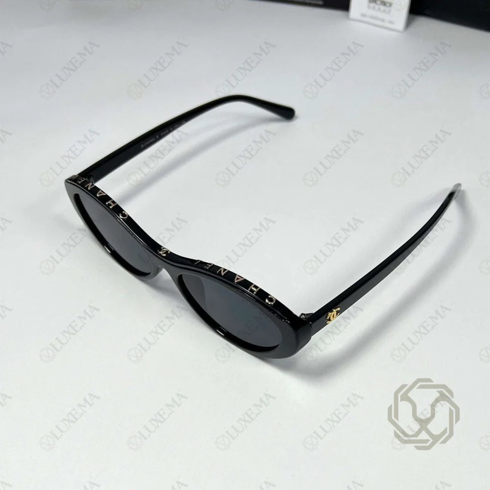 lunettes Chanel ovales, Noires